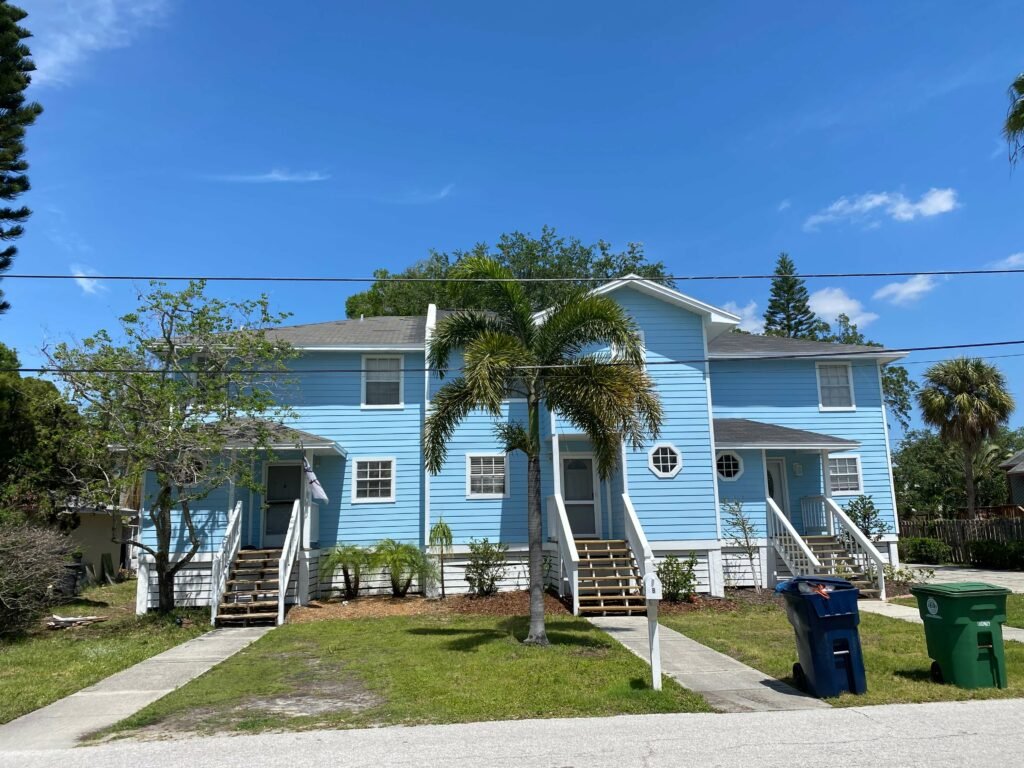 Exterior painting — Coastal two-story home