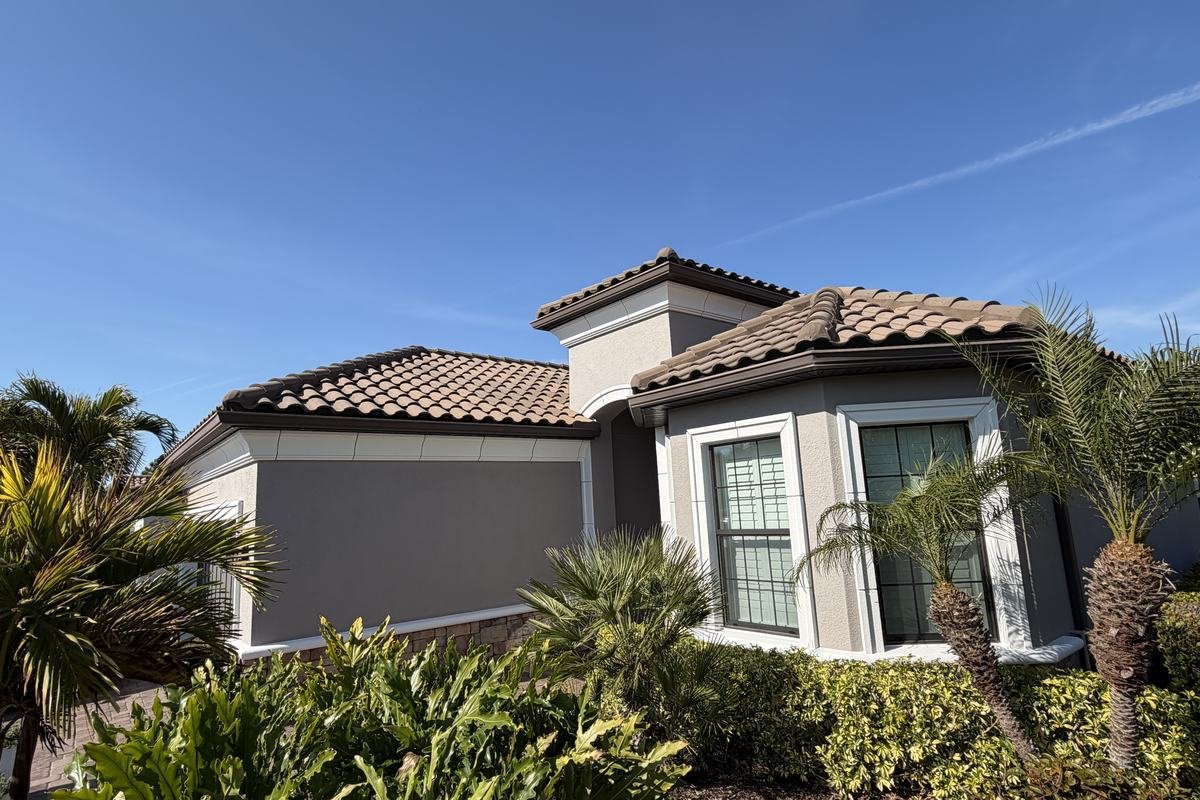 Florida ColorCraft repainted stucco home with tile roof in North Port, Florida
